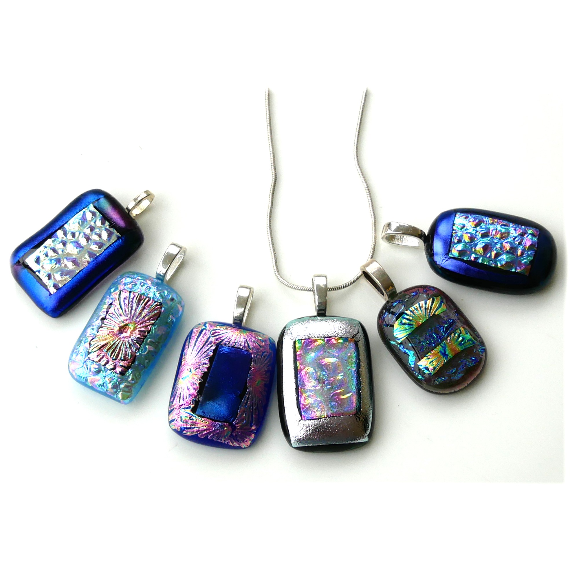 https://thebritishcrafthouse.co.uk/product/dichroic-fused-glass-pendant-silver-chain-choice-set-a001/