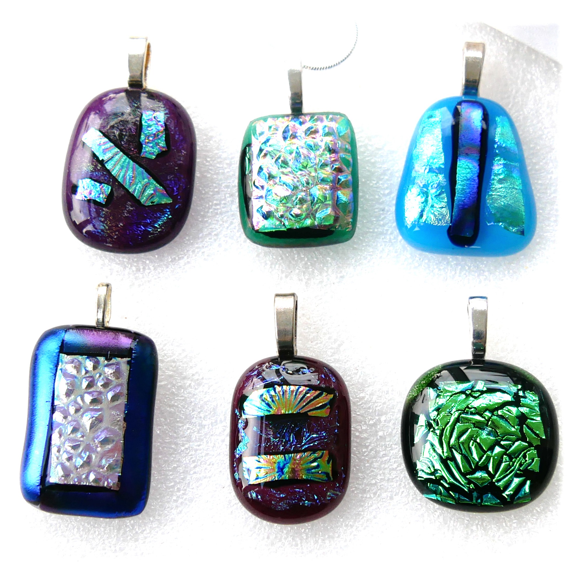https://thebritishcrafthouse.co.uk/product/dichroic-fused-glass-pendant-silver-chain-choice-set-a001/