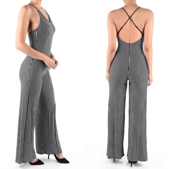 Striped jumpsuit with adjustable straps and low back. Cross back and wide l
