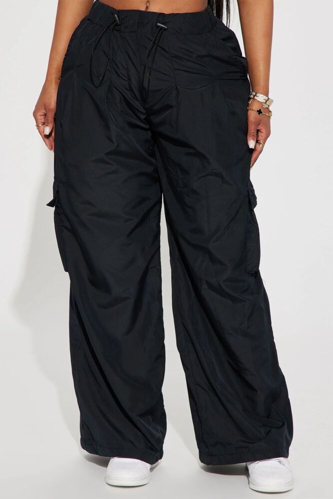 Parachute Pant High Rise Toggle Waistband Wide Leg Nylon Non Stretch Shell: 100% Polyester  Lining: 100% Polyester Exclusive of Trim