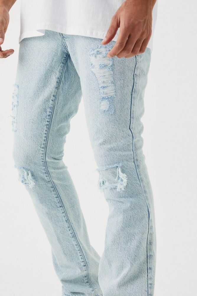 Ice Blue Slim Flare Rip/Repair Jeans Size: 32