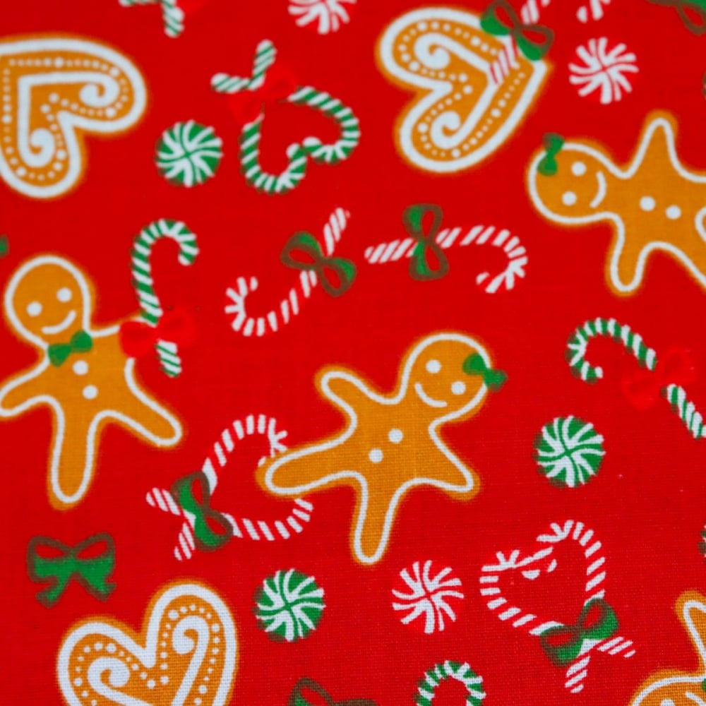 65% Poly/35% Cotton Gingerbread Men on Red - per metre