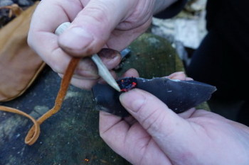 leather- fire-showing ember malipitation with antler toggle-beaver bushcraf