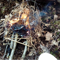 Andy using our hudson bay to make fire
