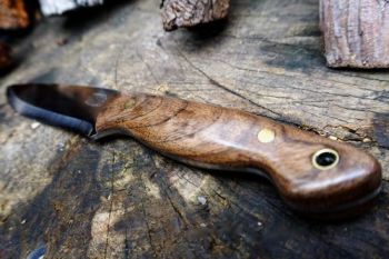 cutting beaver bushcarft survival knife showing handle for website