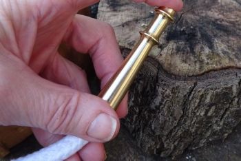 fire brass slow match being used by beaver bushcraft