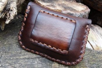 leather. Back veiw of belt pouch made by beaver bushcraft