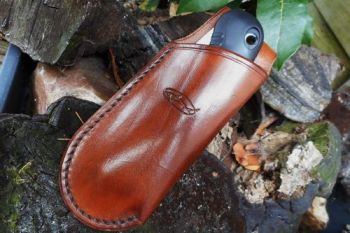 Leather mini saw and sheath made by beaver bushcraft