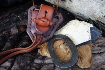 leather &amp; fire steel oval pendant by beaver bushcraft