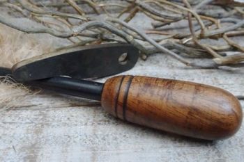 Fire ferro rod with walnut handle for beaver bushcraft