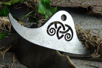 Fire steel viking bow with cut out design by beaver bushcraft