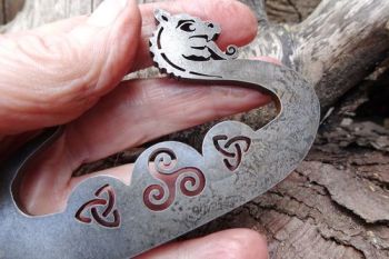 Fire steel showing the larger dragon made by beaver bushcraft