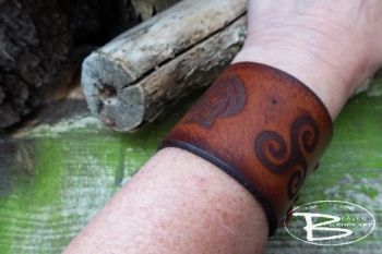Leather viking style cuff with triskele motif by beaver moon leather