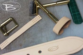 Leather belt being made on the work bench at Beaver Bushcraft