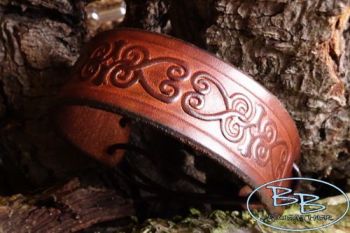 Leather slim hand tooled wrist cuff with celtic heart scroll by beaver bush