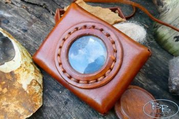 Fire &amp; Leather hand made tinder box with lens made by beaver bushcraft usin