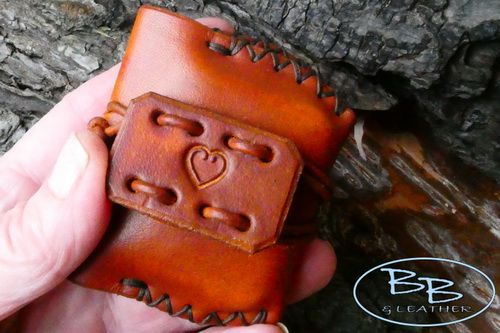 Vintage tin with heart motif by beaver bushcraft