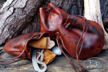 Leather hand painted pouches hand crafted by beaver bushcraft