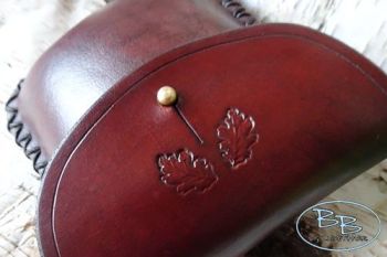 Leather hard pouch in mahogany and acorn detailing by beaver bushcraft