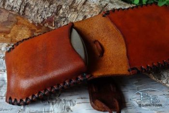 Fire and leather hand stitched mini pouch made by beaver Bushcraft