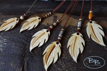 Jewelry wooden feathers by beaver bushcraft