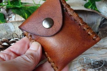 Leather pouch hand stitched for mini fire steel kit by beaver bushcraft