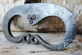 Fire steel made by beaver bushcraft triskele detail in a viking hump