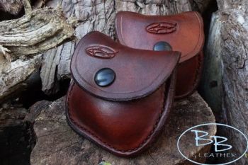 A Leather coin purse hand dyed patina by beaver bushcraft