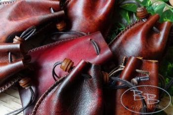 Leather pouches with hand dyed aged effcet old school pouches by beaver bus