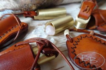 Leather samin style neck pendants by beaver bushcraft with brass inners