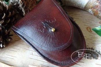 Leather oval pouch with aged patina by beaver bushcraft