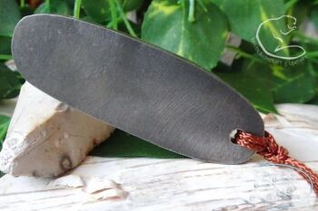 A mini Fire steel oval plain pendant beaver bushcraft