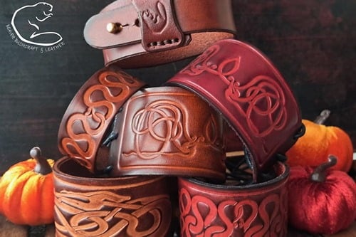 Jewelry leather cuffs made by beaver bushcraft urnes viking styles.jpg