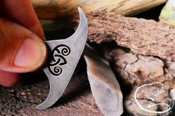 A mini Fire steel stumpy tail pendant striker with flint by beaver bushcraf