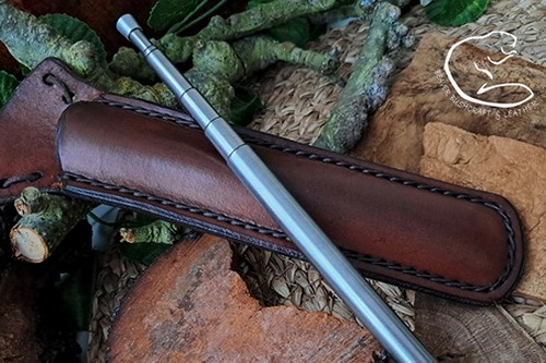 A Fire storm flared bell leather neck sheaths by Beaver Bushcraft.jpg