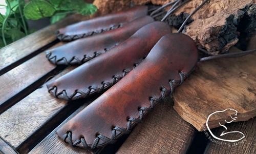 Fire storm the stubby sheathes hand dyed by beaver bushcraft.jpg