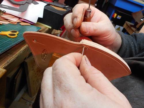 leather-action-sewing the axe head sheaths