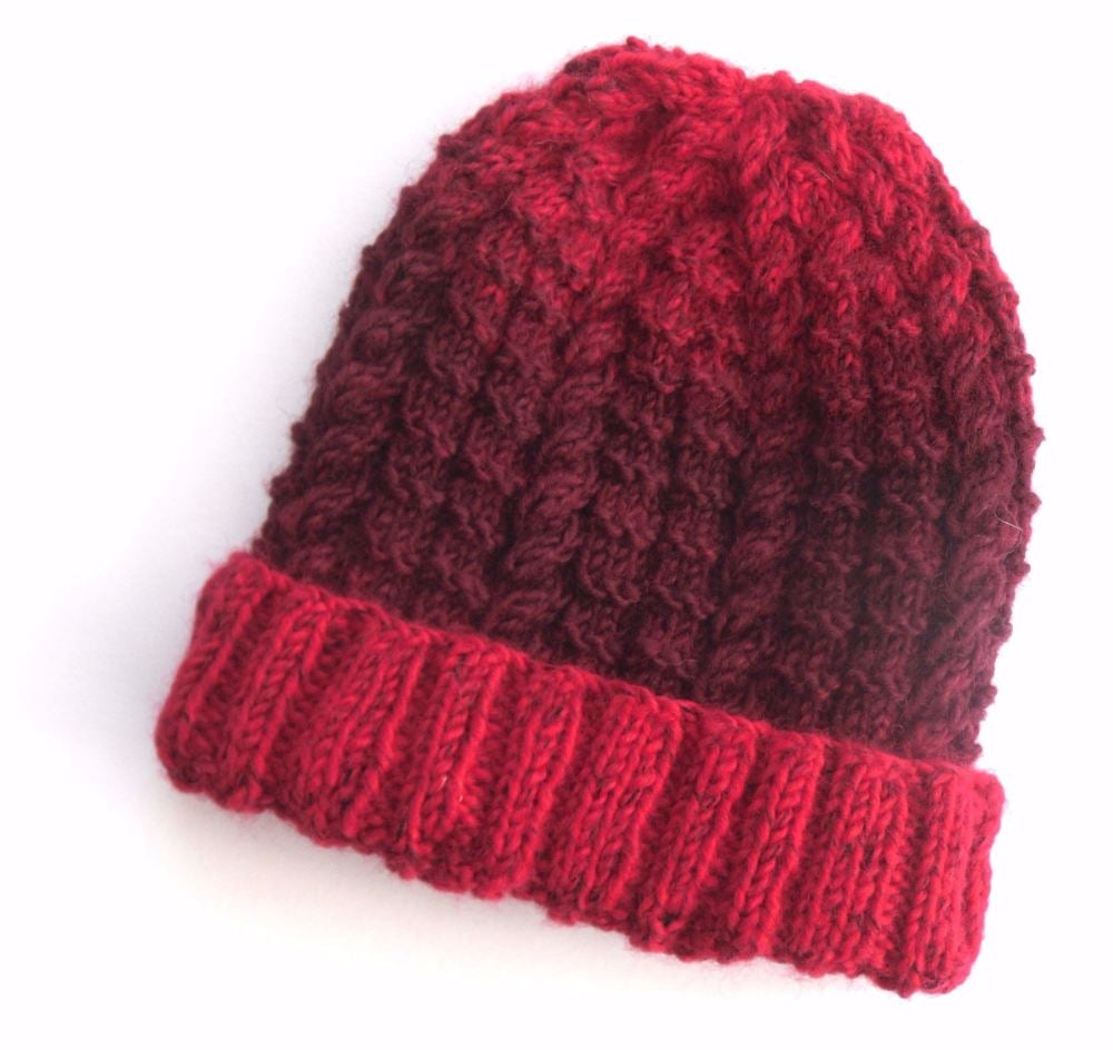 Red knitted beanie hat
