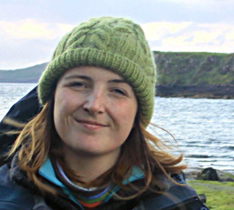 Green cabled beanie hat