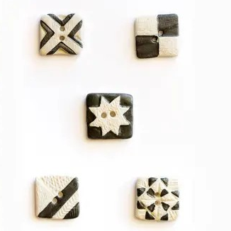 Black and white square buttons