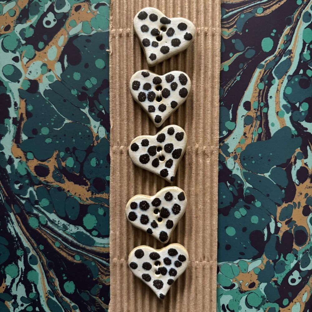 Animal print heart buttons -