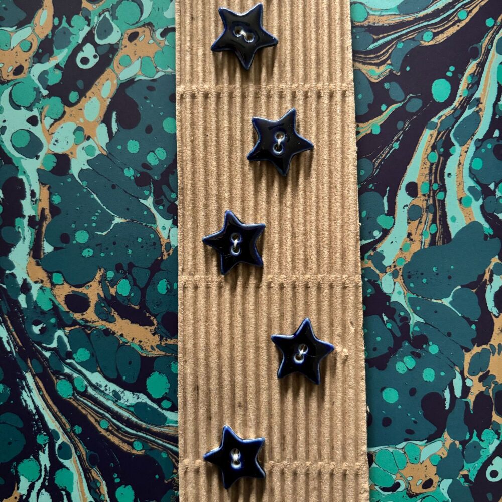 Blue shiny star buttons - 1.3cm wide