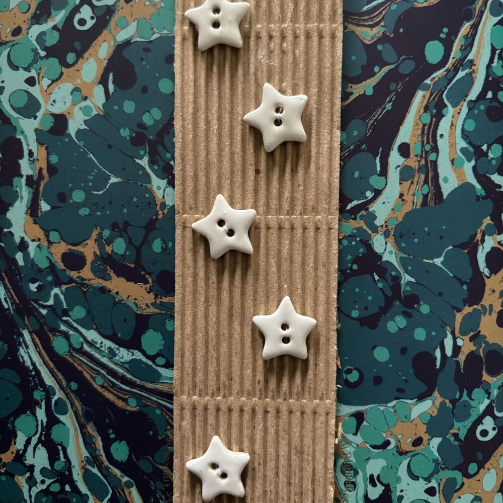 White shiny star buttons - 1.3cm wide