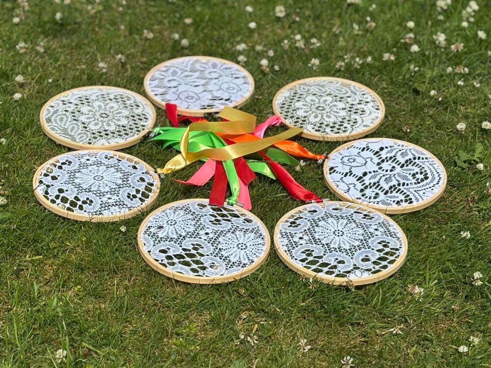 7 small circular lace hanging decorations
