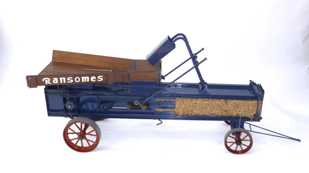 A fine exhibition 3 inch scale model of a Ransomes baler 