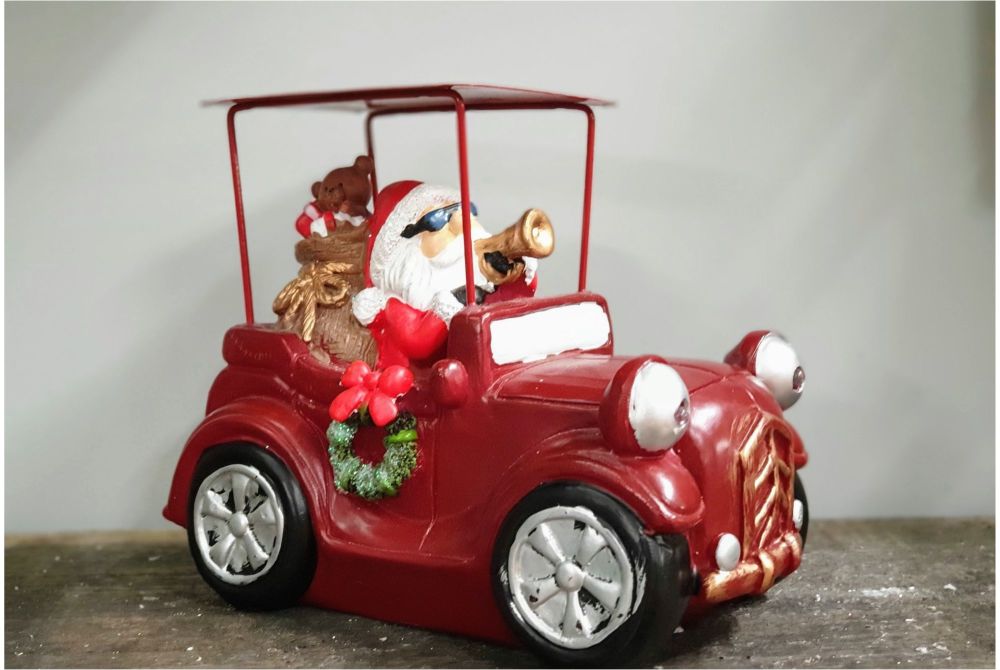 SANTA IN RED CAR with lights