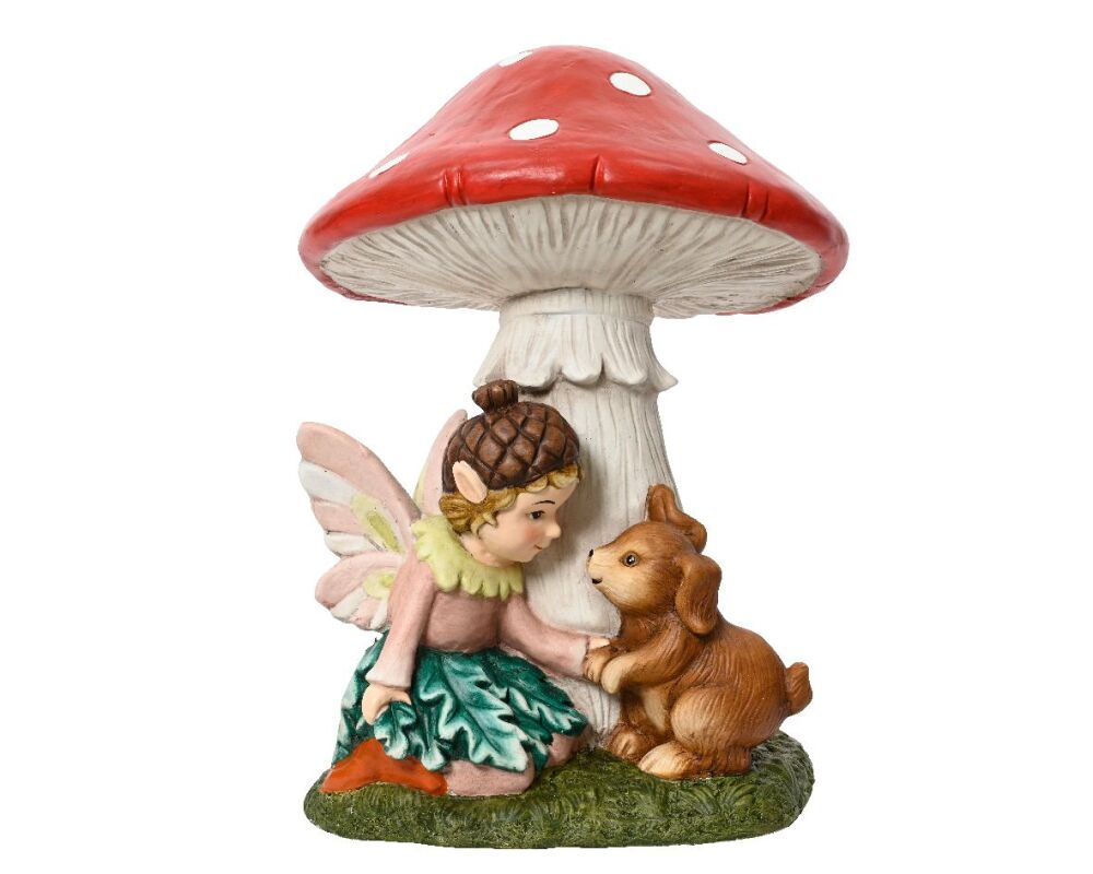 Fairy with mushroom garden ornament