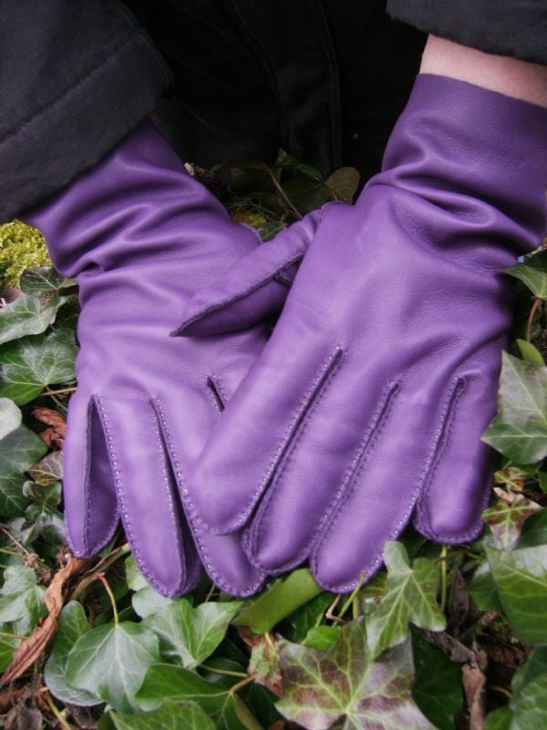 Bespoke gloves. Purple lamb nappa leather that has been hand stitched in lime thread.