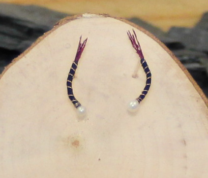 Black nymph with burgundy feather earrings