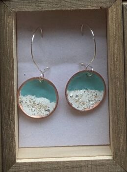 Light blue earrings and pendant cord